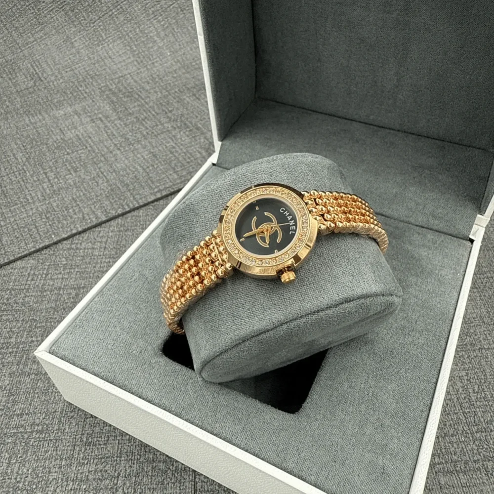 Home 334 Chanel Rythm watch black gold