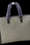 Gucci Supreme laptop bag